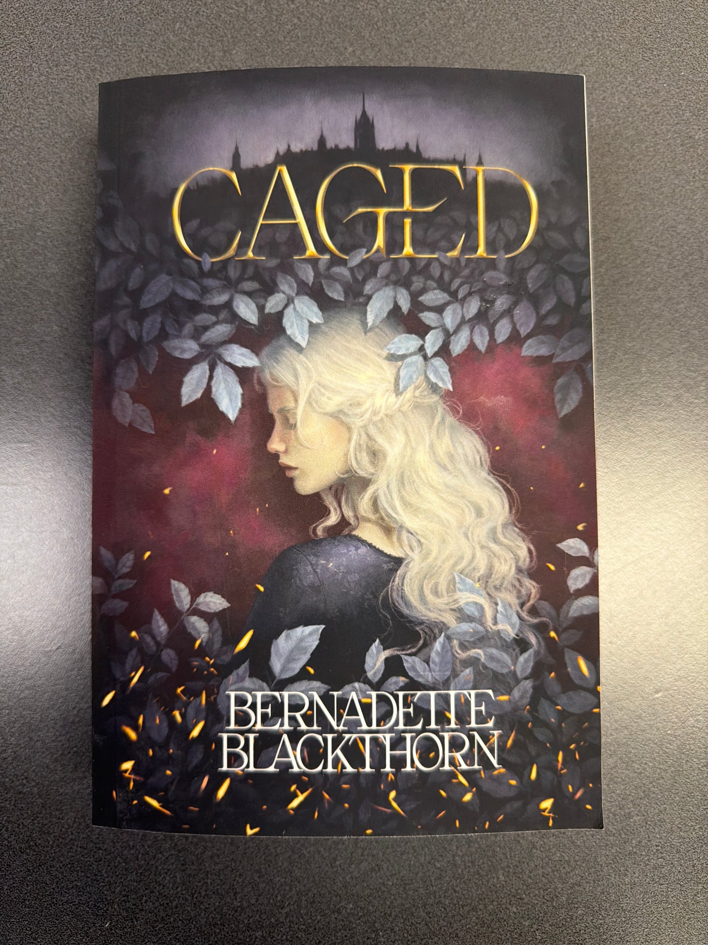 Caged Signed Paperback (ships in 4-5 weeks)